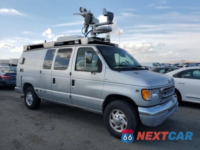 Czwarte zdjęcie samochodu z boku: 2002 FORD ECONOLINE E350 SUPER DUTY VAN VIN:1FTSE34S72HA18698 - miniatura