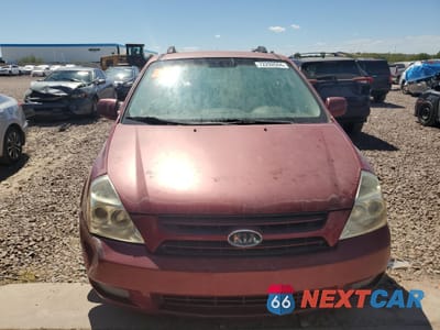 Piąte zdjęcie samochodu w środku: 2006 KIA SEDONA EX VIN:KNDMB233X76182889 - miniatura