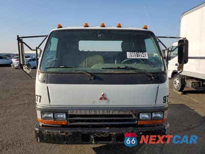 Piąte zdjęcie samochodu w środku: 1996 MITSUBISHI FUSO TRUCK OF AMERICA INC FE 639 VIN:JW6AAE1H6TL000977 - miniatura