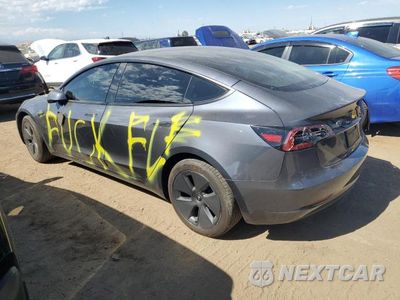 Trzecie zdjęcie samochodu z tyłu: 2023 TESLA MODEL 3 VIN:5YJ3E1EB1PF688455 - miniatura