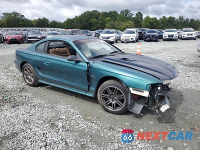 Czwarte zdjęcie samochodu z boku: 1996 FORD MUSTANG GT VIN:1FALP42X1TF217039 - miniatura