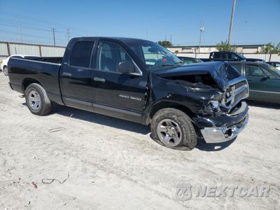 Czwarte zdjęcie samochodu z boku: 2002 DODGE RAM 1500 VIN:3D7HA18N22G153957 - miniatura