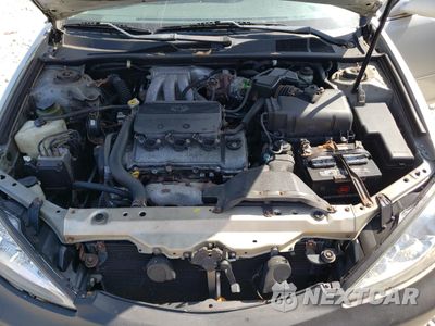 Zdjęcie 11 z 12 samochodu: 2002 TOYOTA CAMRY LE VIN:4T1BF30K82U029408 - miniatura