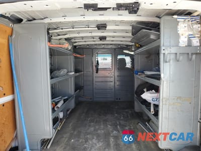 Zdjęcie 10 z 14 samochodu: 2015 NISSAN NV 1500 VIN:1N6BF0KY5FN802854 - miniatura