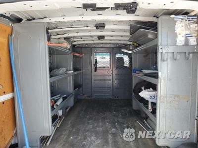 Zdjęcie 10 z 14 samochodu: 2015 NISSAN NV 1500 VIN:1N6BF0KY5FN802854 - miniatura