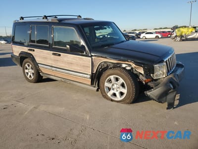 Czwarte zdjęcie samochodu z boku: 2007 JEEP COMMANDER LIMITED VIN:1J8HG58217C591460 - miniatura