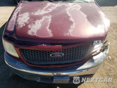 Zdjęcie 11 z 12 samochodu: 2003 FORD F150 VIN:1FTRX08L33KC01949 - miniatura