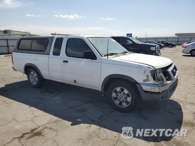 Czwarte zdjęcie samochodu z boku: 2000 NISSAN FRONTIER KING CAB XE VIN:1N6DD26S2YC335276 - miniatura