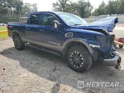 Czwarte zdjęcie samochodu z boku: 2017 NISSAN TITAN XD SL VIN:1N6AA1F45HN572257 - miniatura