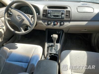 Zdjęcie 8 z 14 samochodu: 2004 TOYOTA CAMRY LE VIN:4T1BF30K54U077936 - miniatura