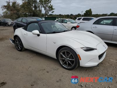Czwarte zdjęcie samochodu z boku: 2016 MAZDA MX-5 MIATA GRAND TOURING VIN:JM1NDAD77G0101666 - miniatura