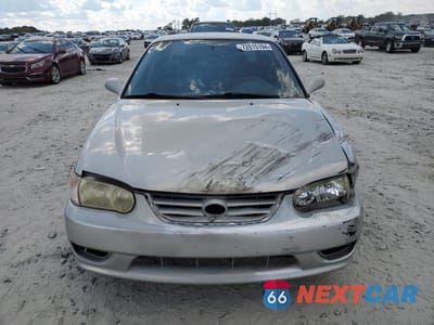 Piąte zdjęcie samochodu w środku: 2002 TOYOTA COROLLA CE VIN:2T1BR12E62C545898 - miniatura