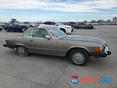 Czwarte zdjęcie samochodu z boku: 1987 MERCEDES-BENZ 560 VIN:WDBBA48D1HA064475 - miniatura