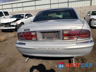 Zdjęcie 6 z 12 samochodu: 1997 BUICK PARK AVENUE ULTRA VIN:1G4CU521XV4617258 - miniatura