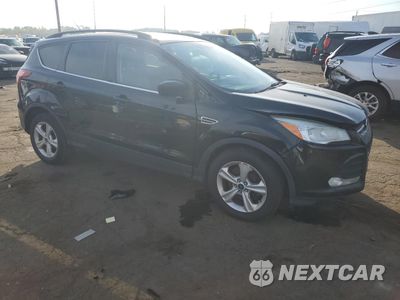 Czwarte zdjęcie samochodu z boku: 2014 FORD ESCAPE SE VIN:1FMCU9G99EUC54621 - miniatura