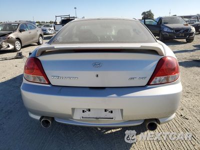 Zdjęcie 6 z 12 samochodu: 2005 HYUNDAI TIBURON GT VIN:KMHHN65F45U174430 - miniatura