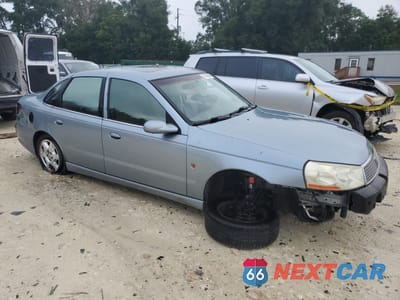 Czwarte zdjęcie samochodu z boku: 2003 SATURN L200 VIN:1G8JU54F73Y525979 - miniatura