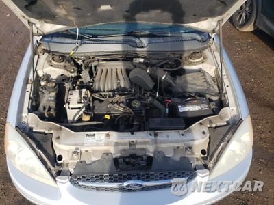Zdjęcie 11 z 12 samochodu: 2001 FORD TAURUS LX VIN:1FAFP52U21G115717 - miniatura