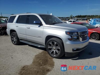 Czwarte zdjęcie samochodu z boku: 2016 CHEVROLET TAHOE K1500 LTZ VIN:1GNSKCKC4GR458133 - miniatura
