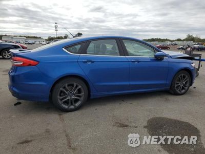Trzecie zdjęcie samochodu z tyłu: 2018 FORD FUSION SE VIN:3FA6P0HD1JR210076 - miniatura