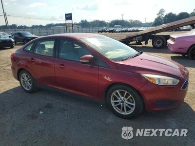 Czwarte zdjęcie samochodu z boku: 2016 FORD FOCUS SE VIN:1FADP3F2XGL402422 - miniatura