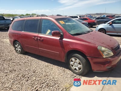Czwarte zdjęcie samochodu z boku: 2006 KIA SEDONA EX VIN:KNDMB233X76182889 - miniatura