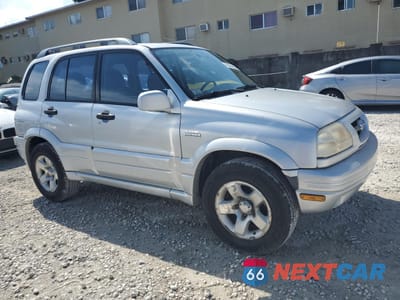 Czwarte zdjęcie samochodu z boku: 1999 SUZUKI GRAND VITARA JX VIN:JS3TD62VXX4126545 - miniatura