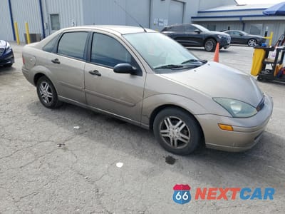 Czwarte zdjęcie samochodu z boku: 2003 FORD FOCUS SE COMFORT VIN:1FAFP34Z23W295528 - miniatura