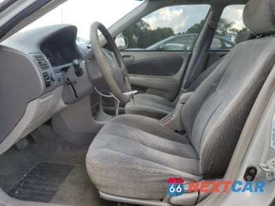 Zdjęcie 7 z 12 samochodu: 2002 TOYOTA COROLLA CE VIN:2T1BR12E62C545898 - miniatura