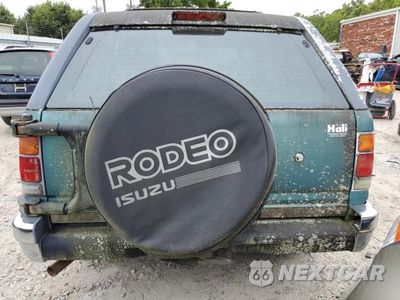 Zdjęcie 6 z 13 samochodu: 1999 ISUZU RODEO VIN:4S2CG58V5R4358677 - miniatura