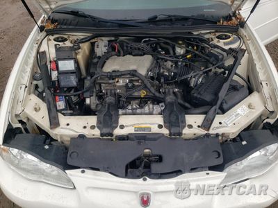 Zdjęcie 12 z 14 samochodu: 2003 CHEVROLET MONTE CARLO LS VIN:2G1WW12EX39215315 - miniatura