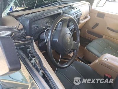 Zdjęcie 8 z 13 samochodu: 1997 JEEP WRANGLER / TJ SAHARA VIN:1J4FY49S3VP518448 - miniatura