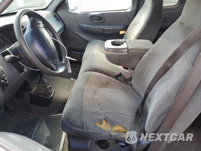 Zdjęcie 7 z 13 samochodu: 2000 FORD F150 VIN:1FTRX18L6YNC02198 - miniatura