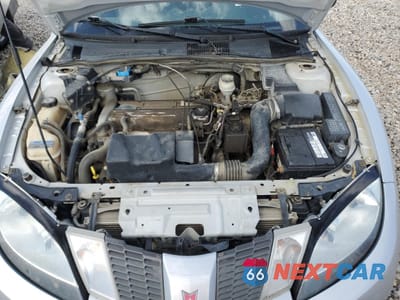 Zdjęcie 11 z 12 samochodu: 2004 PONTIAC SUNFIRE SL VIN:3G2JB52F43S180890 - miniatura