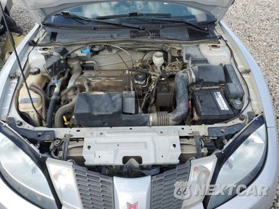 Zdjęcie 11 z 12 samochodu: 2004 PONTIAC SUNFIRE SL VIN:3G2JB52F43S180890 - miniatura