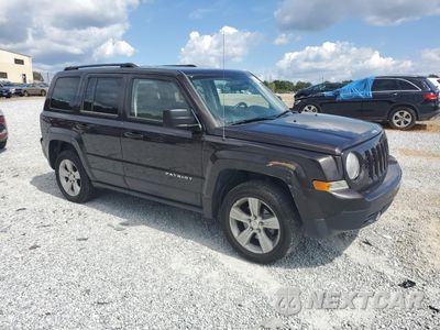 Czwarte zdjęcie samochodu z boku: 2014 JEEP PATRIOT LATITUDE VIN:1C4NJRFB6ED616107 - miniatura