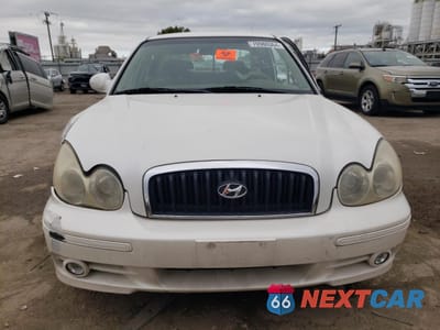 Piąte zdjęcie samochodu w środku: 2003 HYUNDAI SONATA GL VIN:KMHWF25H23A860138 - miniatura