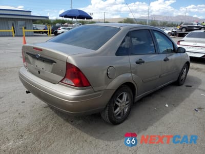 Trzecie zdjęcie samochodu z tyłu: 2003 FORD FOCUS SE COMFORT VIN:1FAFP34Z23W295528 - miniatura