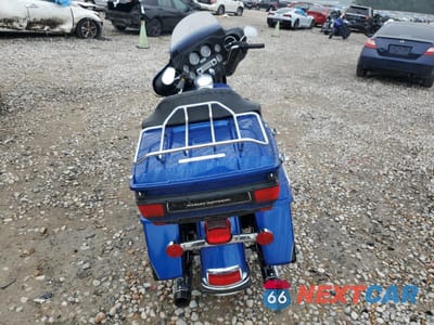 Czwarte zdjęcie samochodu z boku: 2010 HARLEY-DAVIDSON FLHTK VIN:1HD1KEM14AB621163 - miniatura