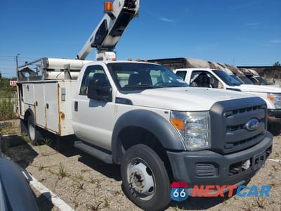 Czwarte zdjęcie samochodu z boku: 2014 FORD F450 SUPER DUTY VIN:1FDUF4GY5EEA62535 - miniatura