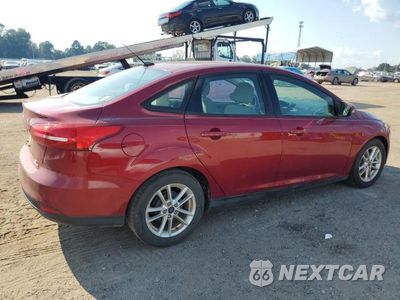 Trzecie zdjęcie samochodu z tyłu: 2016 FORD FOCUS SE VIN:1FADP3F2XGL402422 - miniatura