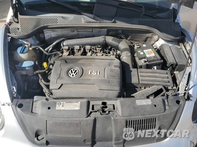 Zdjęcie 12 z 13 samochodu: 2014 VOLKSWAGEN BEETLE VIN:3VWF17AT0EM642115 - miniatura