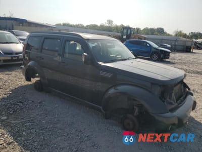 Czwarte zdjęcie samochodu z boku: 2010 DODGE NITRO SXT VIN:1D4PT5GX3AW106689 - miniatura