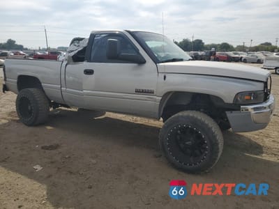 Czwarte zdjęcie samochodu z boku: 1999 DODGE RAM 2500 VIN:1B7KF2362XJ598504 - miniatura