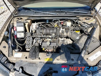 Zdjęcie 13 z 14 samochodu: 2000 CHEVROLET IMPALA VIN:2G1WF55K9Y9174613 - miniatura