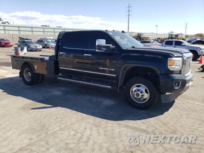 Czwarte zdjęcie samochodu z boku: 2016 GMC SIERRA K3500 DENALI VIN:1GT42YE87GF202818 - miniatura