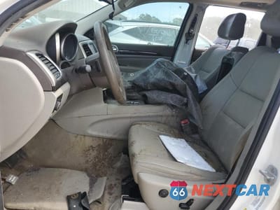 Zdjęcie 7 z 12 samochodu: 2012 JEEP GRAND CHEROKEE LAREDO VIN:1C4RJEAG6CC145981 - miniatura