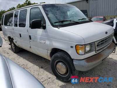 Czwarte zdjęcie samochodu z boku: 1999 FORD ECONOLINE E350 SUPER DUTY WAGON VIN:1FBSS31L6XHB42558 - miniatura