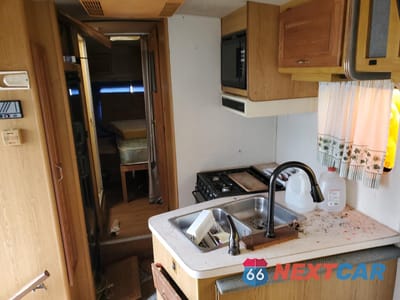 Zdjęcie 9 z 10 samochodu: 1990 FORD ECONOLINE E350 MOTOR HOME CHASSIS VIN:1FCKE33G3LHB74056 - miniatura
