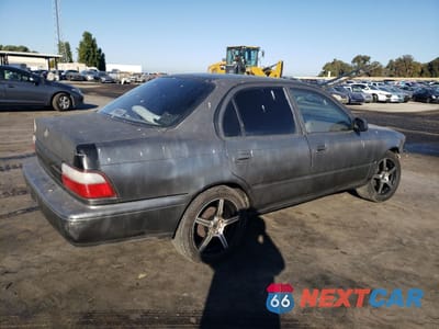 Trzecie zdjęcie samochodu z tyłu: 1996 TOYOTA COROLLA VIN:1NXBA02E4TZ362985 - miniatura